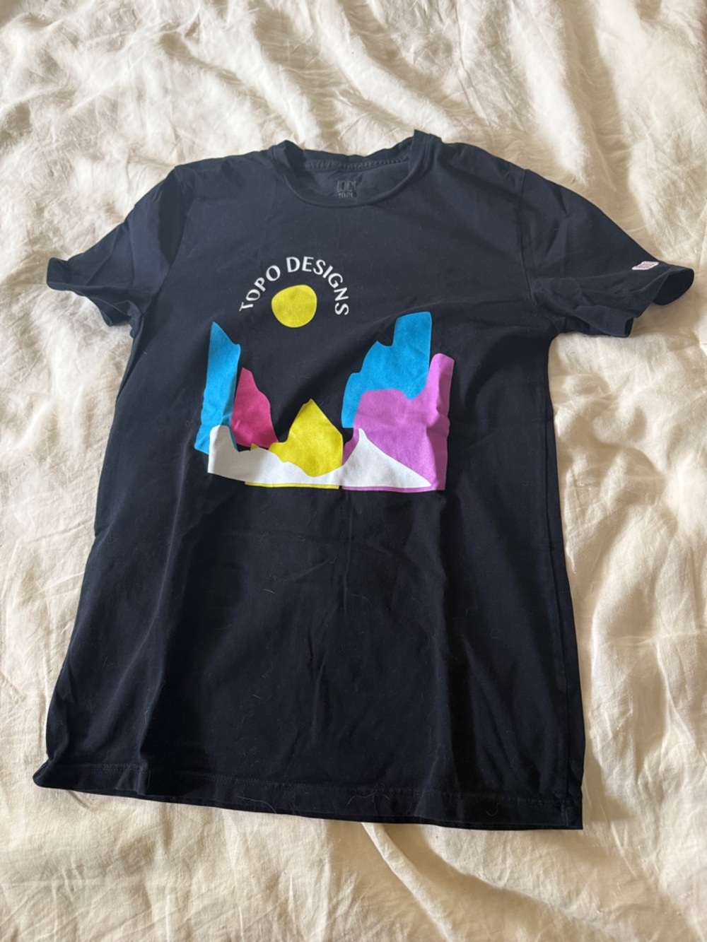 Topo Designs Black Kids Tee with Blue Pink Yellow Mountain Graphic